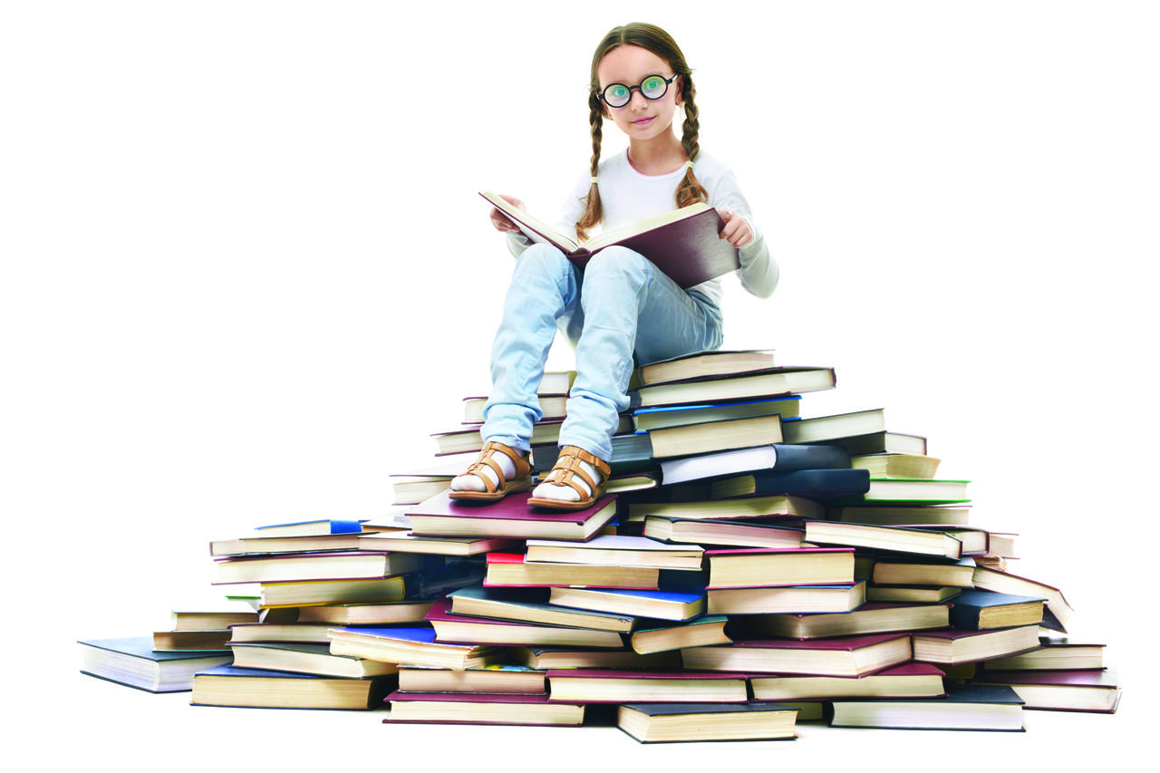 kid on book pile background