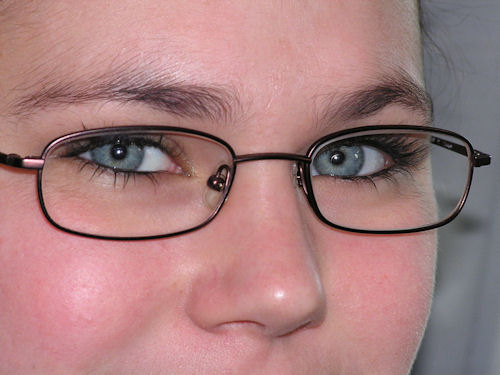 Woman with blue eyes, wearing eyeglasses in Blacksburg, VA