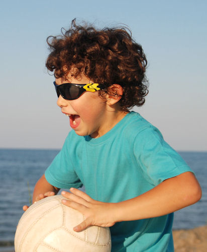 Protect Children's Eyes During Sports - boy with a  ball