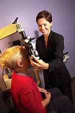 eye doctor with child patient at margolies family eye care in levittown PA