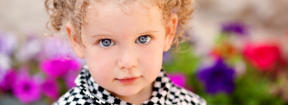 girl%20with%20blue%20eyes%20in%20black%20and%20white%20coat%20slide.png